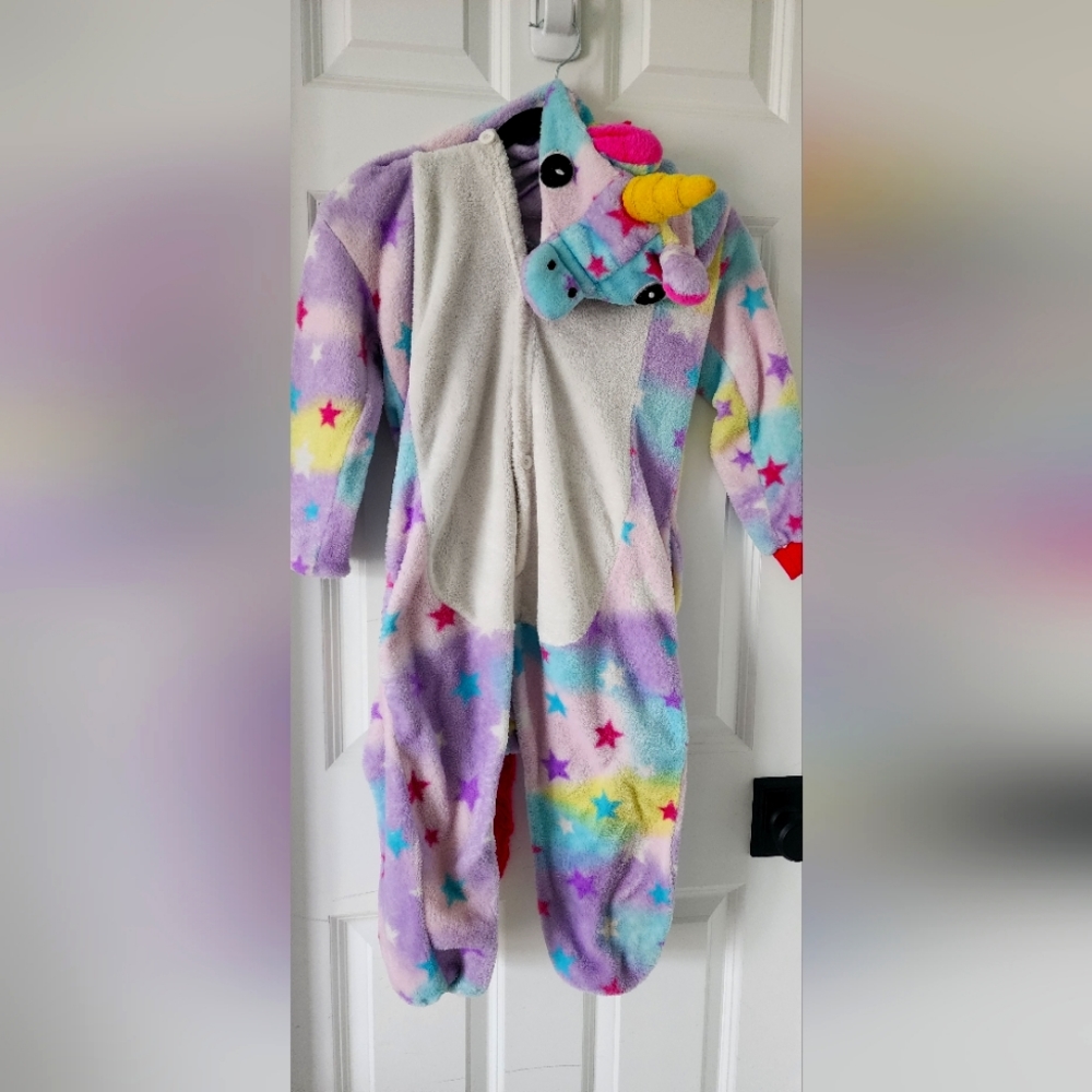 Unicorn onesie and Halloween treat bucket